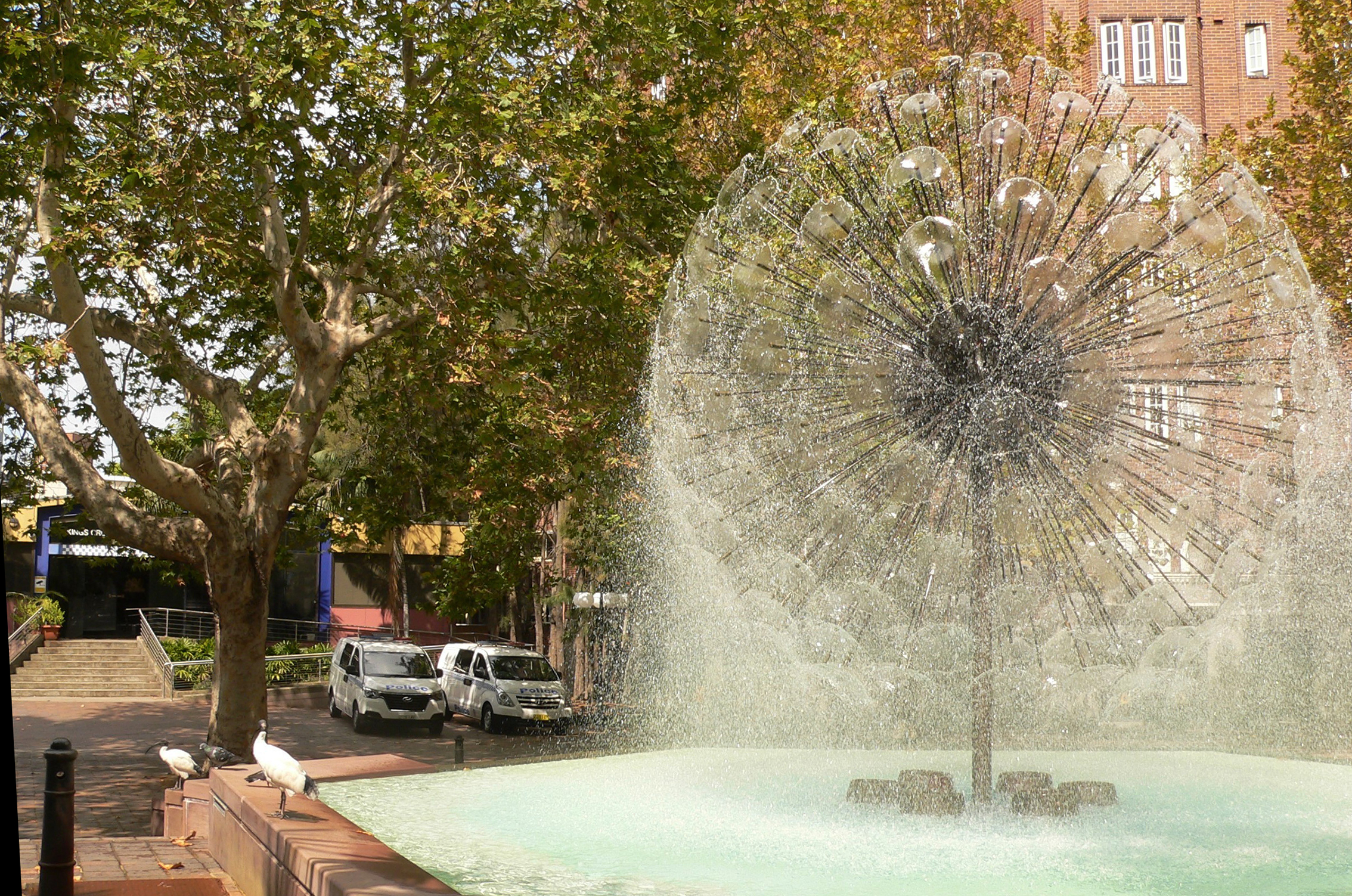 El-Alamein Memorial Fountain and plane trees.